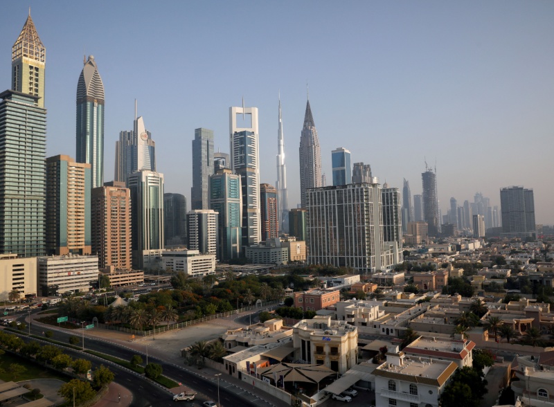 UAE shares ease as oil slips